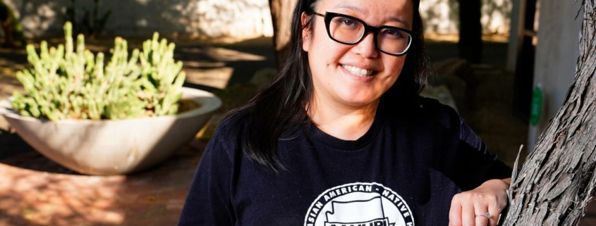 Jennifer Chau, director of the Arizona Asian American Native Hawaiian and Pacific Islander For Equity Coalition, at her office Friday, April 8, 2022, in Tempe, Ariz. (AP Photo/Ross D. Franklin) ROSS D. FRANKLIN AP